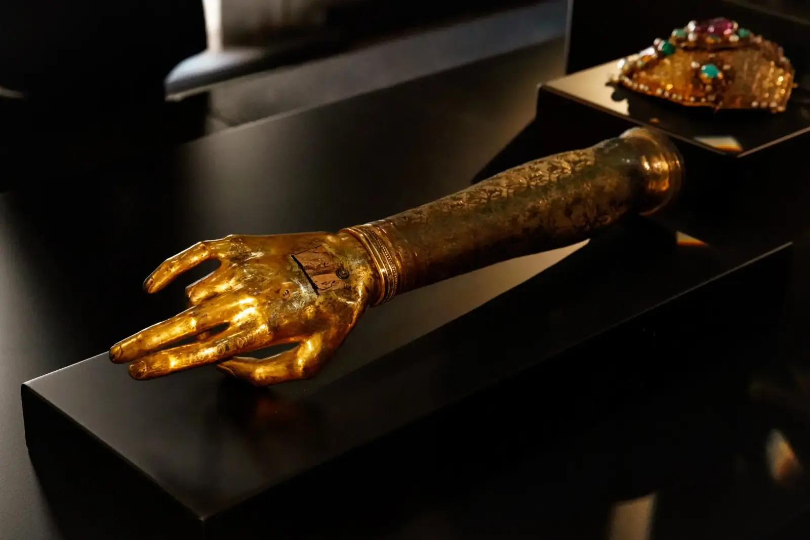 The gold reliquary of John the Baptist's hand and forearm, close up.