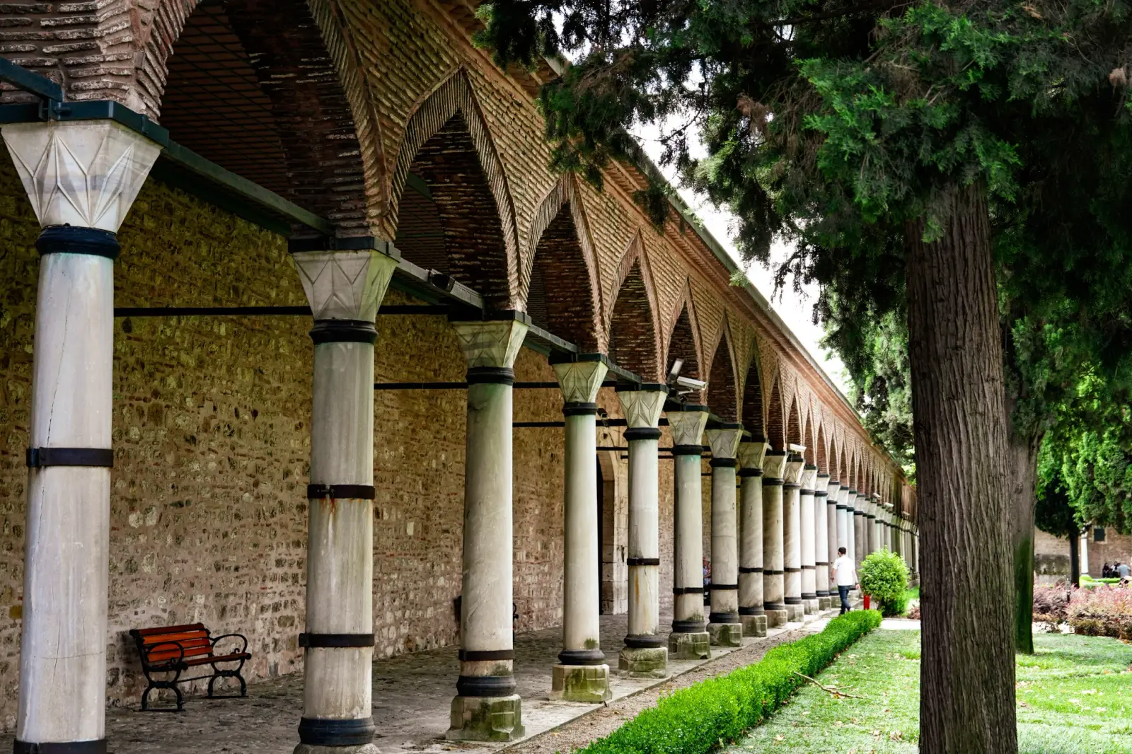 The long arcade of the Palace Kitchens, marble columns carrying brick arches along the Second Courtyard.
