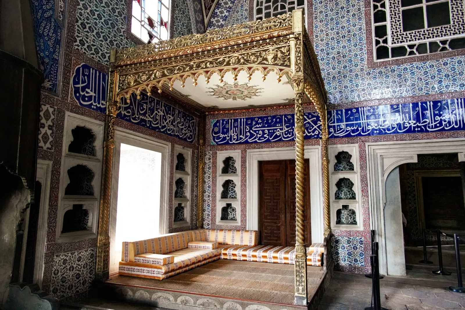 The Privy Chamber of Murad III: İznik tiles, a canopied seat and calligraphic bands — the finest classical interior in the Harem.