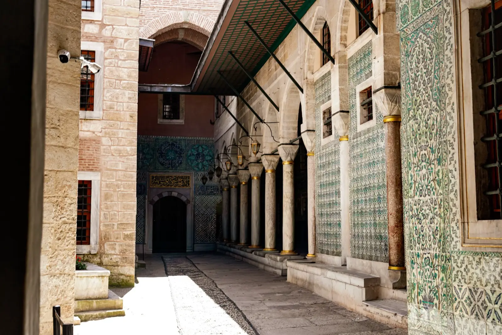The Courtyard of the Black Eunuchs: a narrow tiled colonnade guarding the entrance to the Harem.