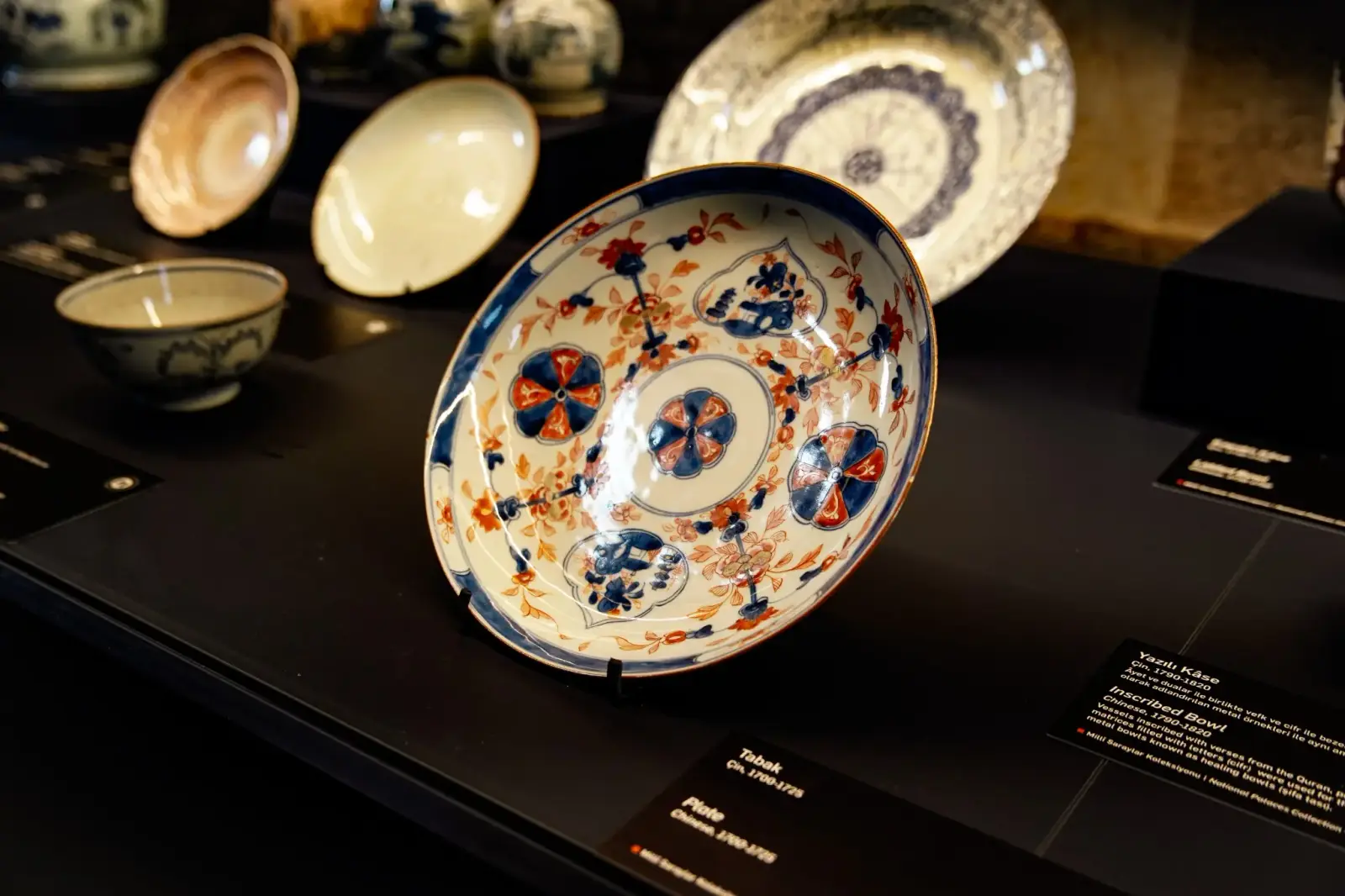 A Chinese porcelain dish in blue and orange, from one of the world's largest palace collections.