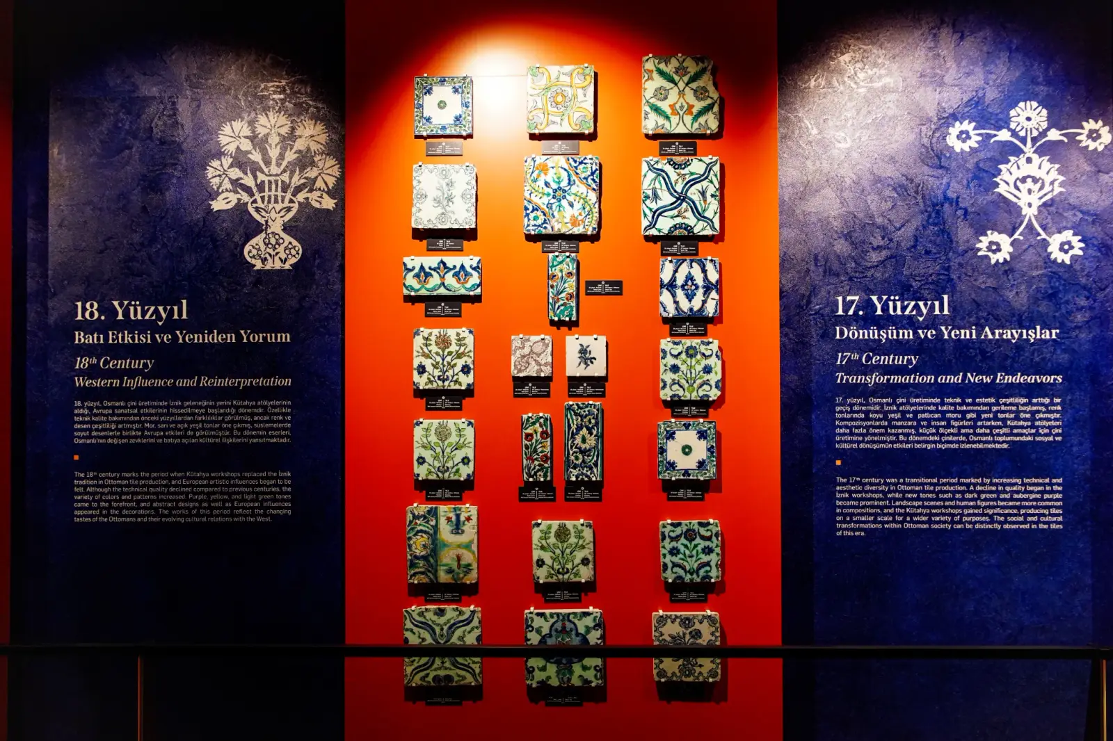 The tile gallery arranged by century, seventeenth-century designs beside eighteenth-century ones.